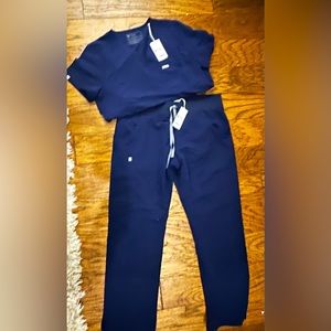 Navy Fig scrubs. Brand new with tags Size Large Petite